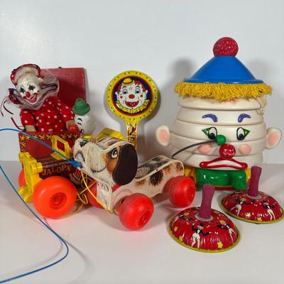LOT 103C: Vintage Children’s Toys - Fisher Price 1965 Jolly Jalopy & Little Snoopy pull toys, Joanne Fox Jack in the Box & More