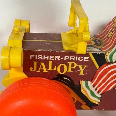 LOT 103C: Vintage Children’s Toys - Fisher Price 1965 Jolly Jalopy & Little Snoopy pull toys, Joanne Fox Jack in the Box & More