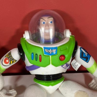 LOT 116C: Disney Collectibles - Wind Up Musical Toy, Figures, Buzz Lightyear Plush Toys & More