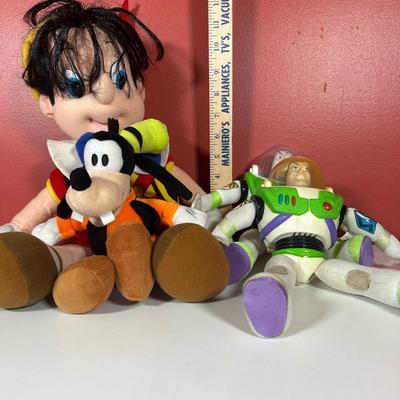 LOT 116C: Disney Collectibles - Wind Up Musical Toy, Figures, Buzz Lightyear Plush Toys & More