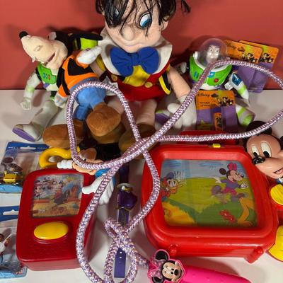 LOT 116C: Disney Collectibles - Wind Up Musical Toy, Figures, Buzz Lightyear Plush Toys & More