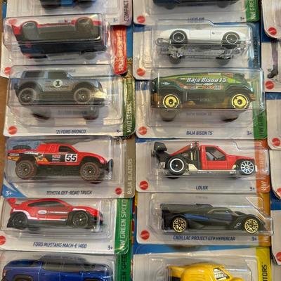 LOT 157C: Large Collection Of Hot Wheels New In Package & Wallet