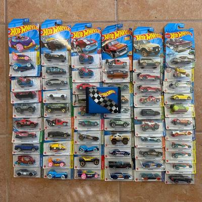 LOT 157C: Large Collection Of Hot Wheels New In Package & Wallet