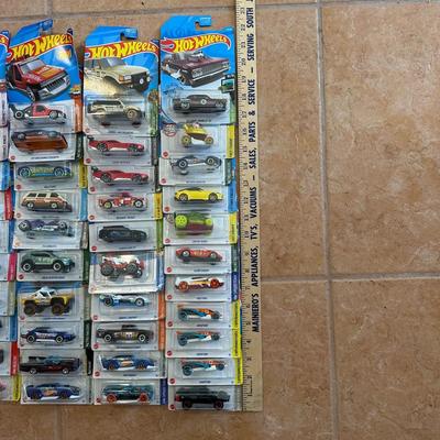 LOT 157C: Large Collection Of Hot Wheels New In Package & Wallet