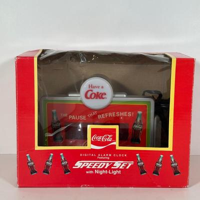 LOT 175C: Coca Cola Decor - Cups, Straws, Mini Clock & More