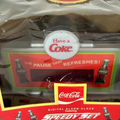 LOT 175C: Coca Cola Decor - Cups, Straws, Mini Clock & More