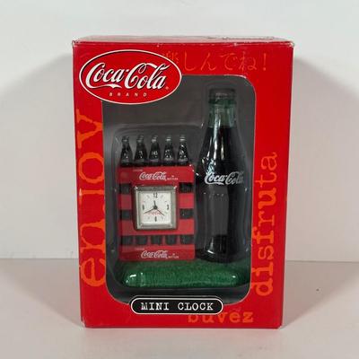 LOT 175C: Coca Cola Decor - Cups, Straws, Mini Clock & More