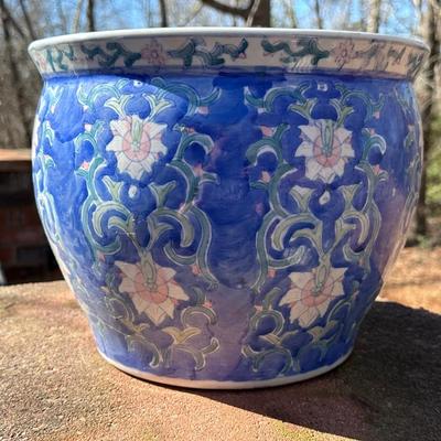 Two Porcelain Planters and a Stand