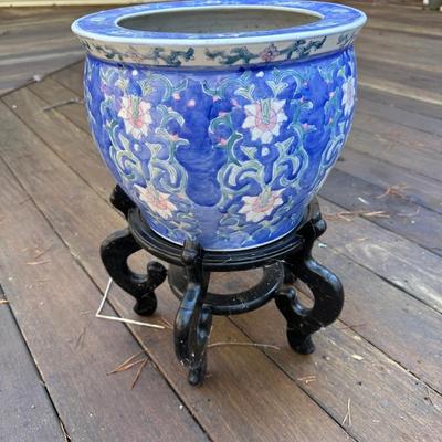 Two Porcelain Planters and a Stand