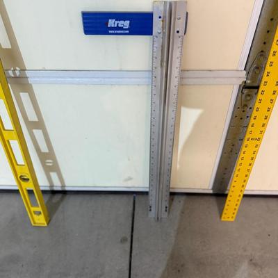 2 Cones, leveler, and measuring sticks