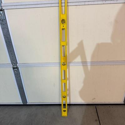 2 Cones, leveler, and measuring sticks