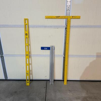 2 Cones, leveler, and measuring sticks