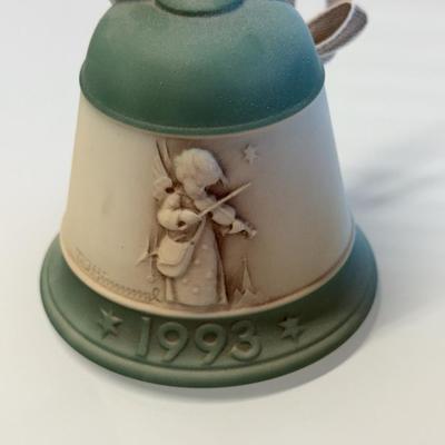 This lot of three M.J. Hummel Christmas bell ornaments