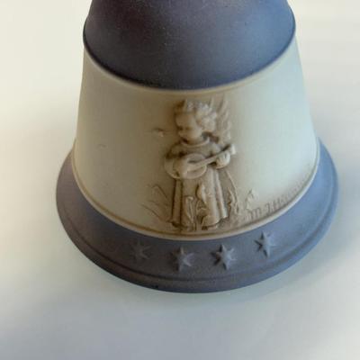 This lot of three M.J. Hummel Christmas bell ornaments