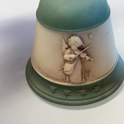 This lot of three M.J. Hummel Christmas bell ornaments