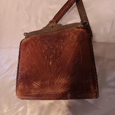 ANTIQUE TOOLED LEATHER PURSE, PENCIL AND MIRROR