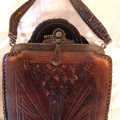 ANTIQUE TOOLED LEATHER PURSE, PENCIL AND MIRROR