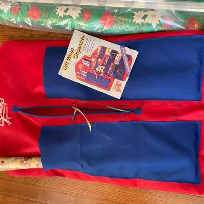 Lot of gift wrap and a gift wrap organizer