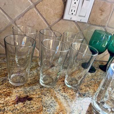 Lot 99 Miscellaneous clear glassware and 2 green wine glasses