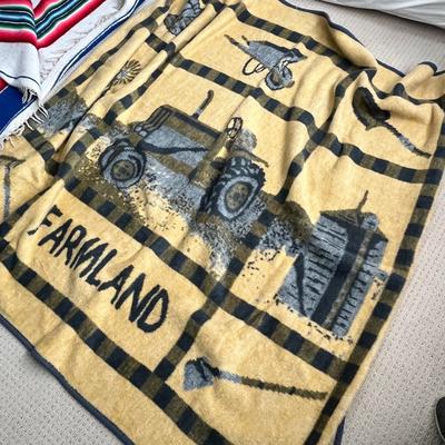 Lot 132 throw blankets 1 farmland fleece, 1 wool blue and white