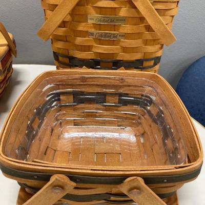 3 larger Longaberger baskets: one with hard top