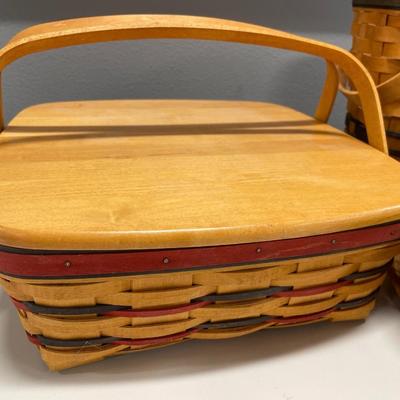 3 larger Longaberger baskets: one with hard top