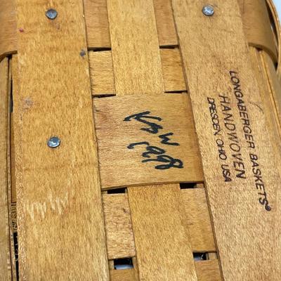 3 larger Longaberger baskets: one with hard top