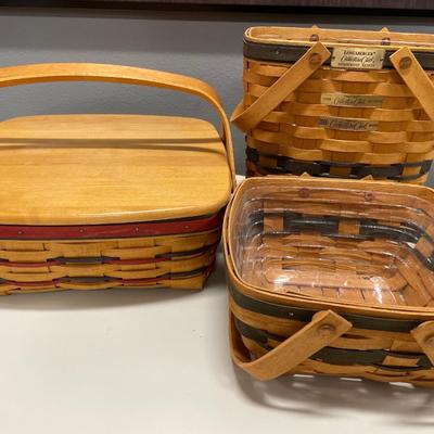 3 larger Longaberger baskets: one with hard top