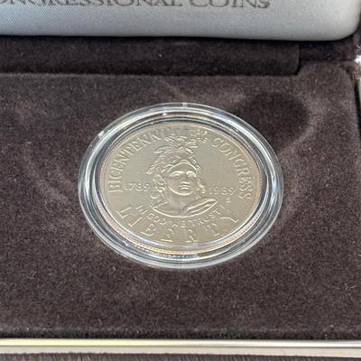 LOT 246: Unites States Constitution 1987 Silver Dollar, United States Olympic Coin 1988 Proof Silver Dollar, United States Proclaining...