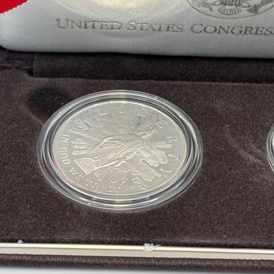 LOT 246: Unites States Constitution 1987 Silver Dollar, United States Olympic Coin 1988 Proof Silver Dollar, United States Proclaining...