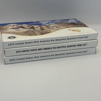 LOT 257: US Mint America the Beautiful Quarters Proof Sets 2010, 2013 & 2015