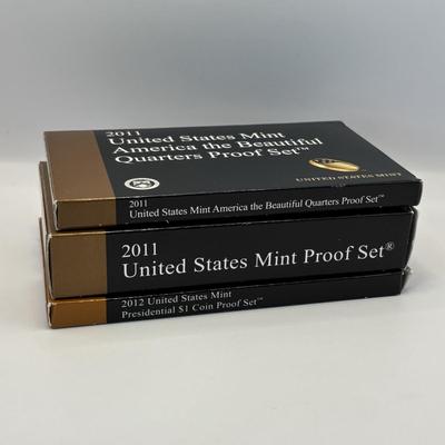 LOT 258: US Mint America The Beautiful Quarters Proof Set 2011 US Mint Proof Set 2011 and US Mint Presidential $1 Coin Proof Set 2012