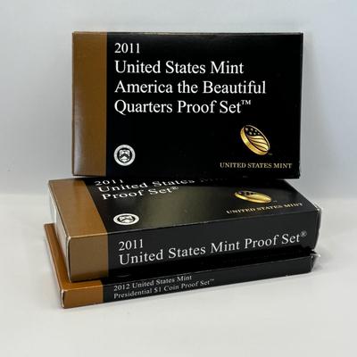 LOT 258: US Mint America The Beautiful Quarters Proof Set 2011 US Mint Proof Set 2011 and US Mint Presidential $1 Coin Proof Set 2012