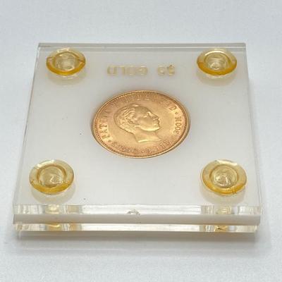 LOT 286j2: 1915 Cuban Cinco (5) Pesos gold coin