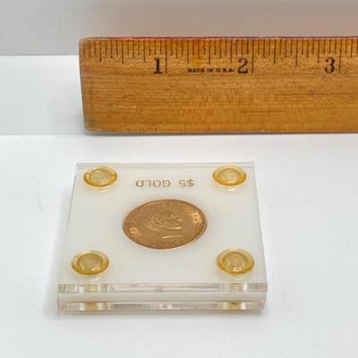 LOT 286j2: 1915 Cuban Cinco (5) Pesos gold coin