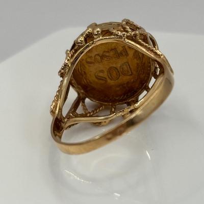 LOT 300: 1945 Dos Pesos Mexican Gold Coin Ring Size 6.5, 18k Gold (Tested) The Coin is 1.66g and 90% Gold and the Setting is 18K Gold.
