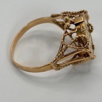 LOT 300: 1945 Dos Pesos Mexican Gold Coin Ring Size 6.5, 18k Gold (Tested) The Coin is 1.66g and 90% Gold and the Setting is 18K Gold.