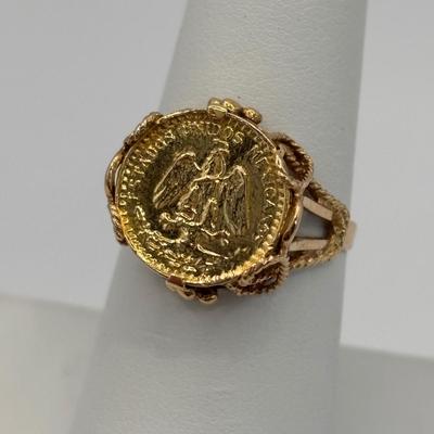 LOT 300: 1945 Dos Pesos Mexican Gold Coin Ring Size 6.5, 18k Gold (Tested) The Coin is 1.66g and 90% Gold and the Setting is 18K Gold.
