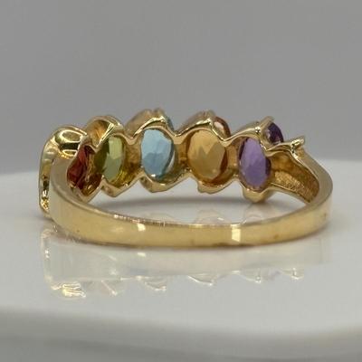 LOT 298: 14 K Gold (tested) Ring Semi-Precious Gemstone Anethyst, Blue Topaz, Peridot, Garnet Size 6 - 2.1 gtw