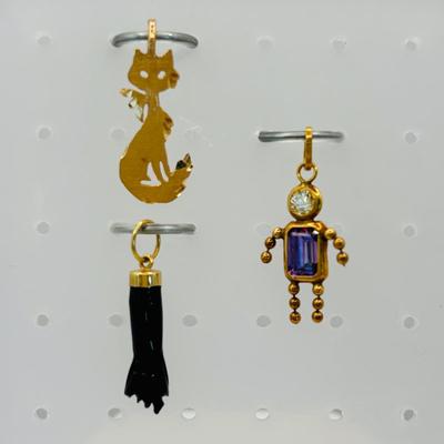 LOT 310: 14K Gold La Mano Figa Pendant/Charm, 585 Child Pendant /Charm with Crystals, and 14K Gold Ma Michael Anthony Siamese Cat Pendant...