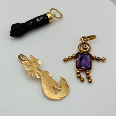 LOT 310: 14K Gold La Mano Figa Pendant/Charm, 585 Child Pendant /Charm with Crystals, and 14K Gold Ma Michael Anthony Siamese Cat Pendant...