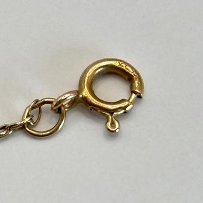 LOT 312: Vintage 14k Gold 22" Long Chain with Diamond Chip Cross Pendant 2.2 gtw