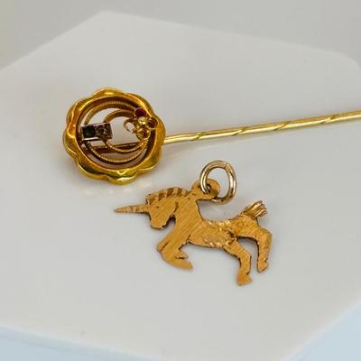 LOT 313: Monet Charm Bracelet with 8 Charms. Chain is 7.5" and has Safety Chain & More