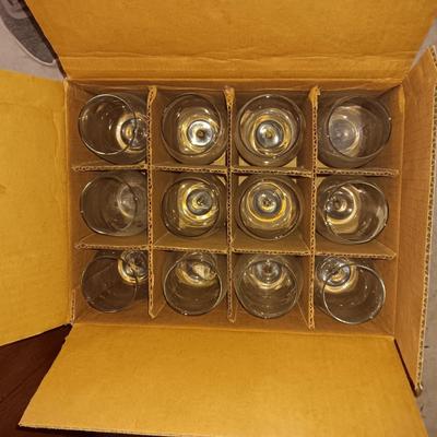 DINING ROOM HUTCH WITH AN ABUNDANCE OF STORAGE AND 12 STEMMED GLASSES