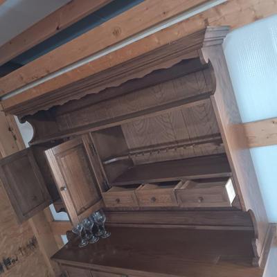 DINING ROOM HUTCH WITH AN ABUNDANCE OF STORAGE AND 12 STEMMED GLASSES