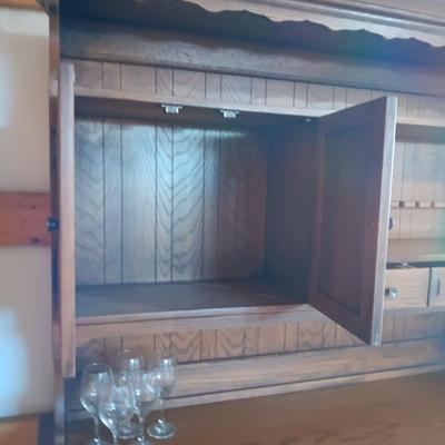 DINING ROOM HUTCH WITH AN ABUNDANCE OF STORAGE AND 12 STEMMED GLASSES