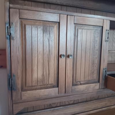 DINING ROOM HUTCH WITH AN ABUNDANCE OF STORAGE AND 12 STEMMED GLASSES