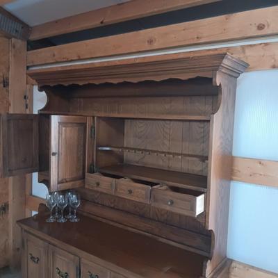 DINING ROOM HUTCH WITH AN ABUNDANCE OF STORAGE AND 12 STEMMED GLASSES