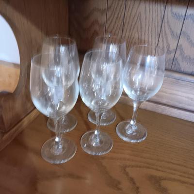 DINING ROOM HUTCH WITH AN ABUNDANCE OF STORAGE AND 12 STEMMED GLASSES