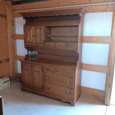 DINING ROOM HUTCH WITH AN ABUNDANCE OF STORAGE AND 12 STEMMED GLASSES